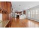 Spacious kitchen featuring hardwood floors, dark wood cabinets and stainless steel refrigerator at , Marietta, GA 30062