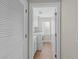 Well-lit laundry room with white cabinets, sink, washer, and dryer at 3855 Cohutta Pass, Marietta, GA 30062