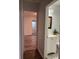 Bright bathroom featuring a white vanity with sink, a tiled floor, and a mirror at 1076 Grant Se Way, Atlanta, GA 30315