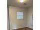 Bedroom with light walls, wood flooring and a window providing ample natural light at 1076 Grant Se Way, Atlanta, GA 30315