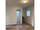Cozy bedroom featuring sleek wood flooring, neutral walls and ample lighting at 1076 Grant Se Way, Atlanta, GA 30315