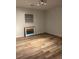 This bedroom features hard wood floors, large windows, modern lighting and neutral wall colors at 1076 Grant Se Way, Atlanta, GA 30315