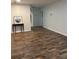 A living room featuring new hardwood floors, neutral wall colors, and plenty of natural light at 1076 Grant Se Way, Atlanta, GA 30315