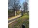 Stone columns mark the entry to a lush park, perfect for leisurely strolls at 1076 Grant Se Way, Atlanta, GA 30315