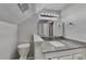 Bathroom featuring granite countertops and a large vanity mirror at 1809 Fairpointe Trce, Stone Mountain, GA 30088