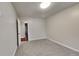 Cozy bedroom with neutral carpet, fresh paint and ample natural light at 1809 Fairpointe Trce, Stone Mountain, GA 30088