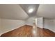 Bonus room with wood-look flooring and neutral walls at 1809 Fairpointe Trce, Stone Mountain, GA 30088