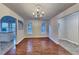 Open dining room with hardwood floors and abundant natural light at 1809 Fairpointe Trce, Stone Mountain, GA 30088