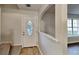 Inviting entryway with tile floors and a decorative glass front door at 1809 Fairpointe Trce, Stone Mountain, GA 30088