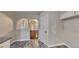 Open-concept kitchen with a breakfast bar and seamless flow to dining area at 1809 Fairpointe Trce, Stone Mountain, GA 30088