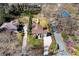 Aerial view of a home with mature trees and a neatly manicured yard at 2795 Kimmeridge Dr, Atlanta, GA 30344