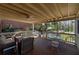 Comfortable outdoor deck with seating area overlooking a well manicured lawn and garden at 2795 Kimmeridge Dr, Atlanta, GA 30344