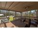 Comfortable outdoor deck overlooking a well manicured lawn and garden with mature trees at 2795 Kimmeridge Dr, Atlanta, GA 30344