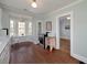 Bright kitchen featuring wood floors, stainless steel appliances, and breakfast nook with natural light at 2795 Kimmeridge Dr, Atlanta, GA 30344