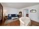 Well-lit living room with hardwood floors, white walls, and classic furniture at 2795 Kimmeridge Dr, Atlanta, GA 30344