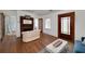 Bright living room with hardwood floors, fireplace, and large windows offering natural light at 2795 Kimmeridge Dr, Atlanta, GA 30344