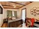 Bedroom featuring a wood plank ceiling, neutral walls, and light-colored wood floors at 3007 Pasadena Dr, Decatur, GA 30032