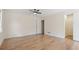 A bright bedroom with hardwood floors, ceiling fan, and a spacious closet at 3061 Stone Bridge Sw Trl, Conyers, GA 30094