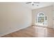 Bright bedroom featuring hardwood floors and a window that provides plenty of natural light at 3061 Stone Bridge Sw Trl, Conyers, GA 30094