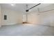 A spacious garage featuring a large open area for parking and storage at 3061 Stone Bridge Sw Trl, Conyers, GA 30094