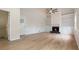 Open living room with fireplace and built-ins at 3061 Stone Bridge Sw Trl, Conyers, GA 30094