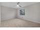 Bright bedroom with a large window that provides great natural light and plush carpet at 6382 Revena Dr, Morrow, GA 30260