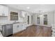 Bright kitchen features granite countertops, stainless steel appliances, and ample storage at 6382 Revena Dr, Morrow, GA 30260