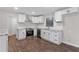 Modern kitchen with granite countertops, stainless steel appliances, and plenty of cabinet space at 6382 Revena Dr, Morrow, GA 30260