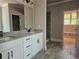 Modern bathroom with granite countertops, double sinks, and a large shower at 6841 Phillips Mill Rd, Douglasville, GA 30135