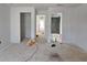 Bathroom under construction features a view into the shower, and doorways to other spaces at 6841 Phillips Mill Rd, Douglasville, GA 30135