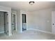 Neutral-colored walls and multiple doors give this bedroom a clean, modern look at 6841 Phillips Mill Rd, Douglasville, GA 30135