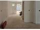 Unfinished hallway space, showing neutral wall colors ready for personalization at 6841 Phillips Mill Rd, Douglasville, GA 30135