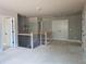 Upstairs hallway with hardwood railing and spindle balusters shows access to rooms and closet at 6841 Phillips Mill Rd, Douglasville, GA 30135