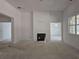 Unfinished living room featuring a fireplace and open layout ready to be transformed at 6841 Phillips Mill Rd, Douglasville, GA 30135