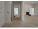 Open concept living space with fireplace, awaiting personalization and finishing touches at 6841 Phillips Mill Rd, Douglasville, GA 30135