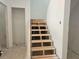 Unfinished wooden staircase awaiting construction and customization at 6841 Phillips Mill Rd, Douglasville, GA 30135