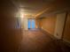 Unfinished basement area featuring neutral walls, carpet, and sliding glass doors to the exterior at 7042 Oakhill Cir, Austell, GA 30168