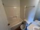 Bathroom featuring a standard shower-tub combination, toilet, and vanity sink at 7042 Oakhill Cir, Austell, GA 30168