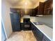 Functional kitchen featuring essential appliances and storage at 7042 Oakhill Cir, Austell, GA 30168