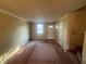 Inviting living room with a large window, providing plenty of natural light and space at 7042 Oakhill Cir, Austell, GA 30168