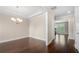 Elegant dining room with hardwood floors, decorative lighting, and classic trim work throughout at 830 Nottingham Se Dr, Smyrna, GA 30082
