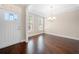 Bright dining room with hardwood floors, natural light and classic trim work throughout at 830 Nottingham Se Dr, Smyrna, GA 30082