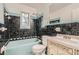 Bathroom featuring blue fixtures and black and blue marble tile walls at 195 Hermer Nw Cir, Atlanta, GA 30311
