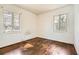 Bedroom with hardwood floors and natural light from two windows at 195 Hermer Nw Cir, Atlanta, GA 30311