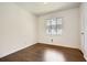 Bedroom with hardwood floors and a window overlooking the yard at 195 Hermer Nw Cir, Atlanta, GA 30311
