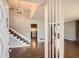 Spacious foyer with staircase, chandelier and wood floors at 195 Hermer Nw Cir, Atlanta, GA 30311