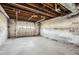 Empty garage with exposed ductwork and cinder block walls at 195 Hermer Nw Cir, Atlanta, GA 30311