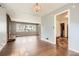 Open living room with hardwood floors, brick fireplace and window views at 195 Hermer Nw Cir, Atlanta, GA 30311