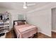 Bedroom features natural light, ceiling fan, a comfortable bed and closet for storage at 3021 San Juan Dr, Decatur, GA 30032