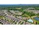 Neighborhood aerial view with a community pool and lush trees nearby, showcasing the neighborhood layout at 4105 Brookview Dr, Cumming, GA 30040